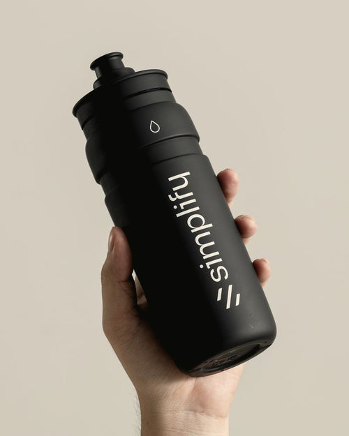 Secret Salt Sports Bottle, black shaker held in hand